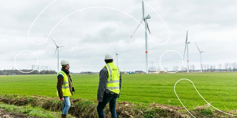 Windturbines brengen hernieuwbare energie op het Fluvius-net.